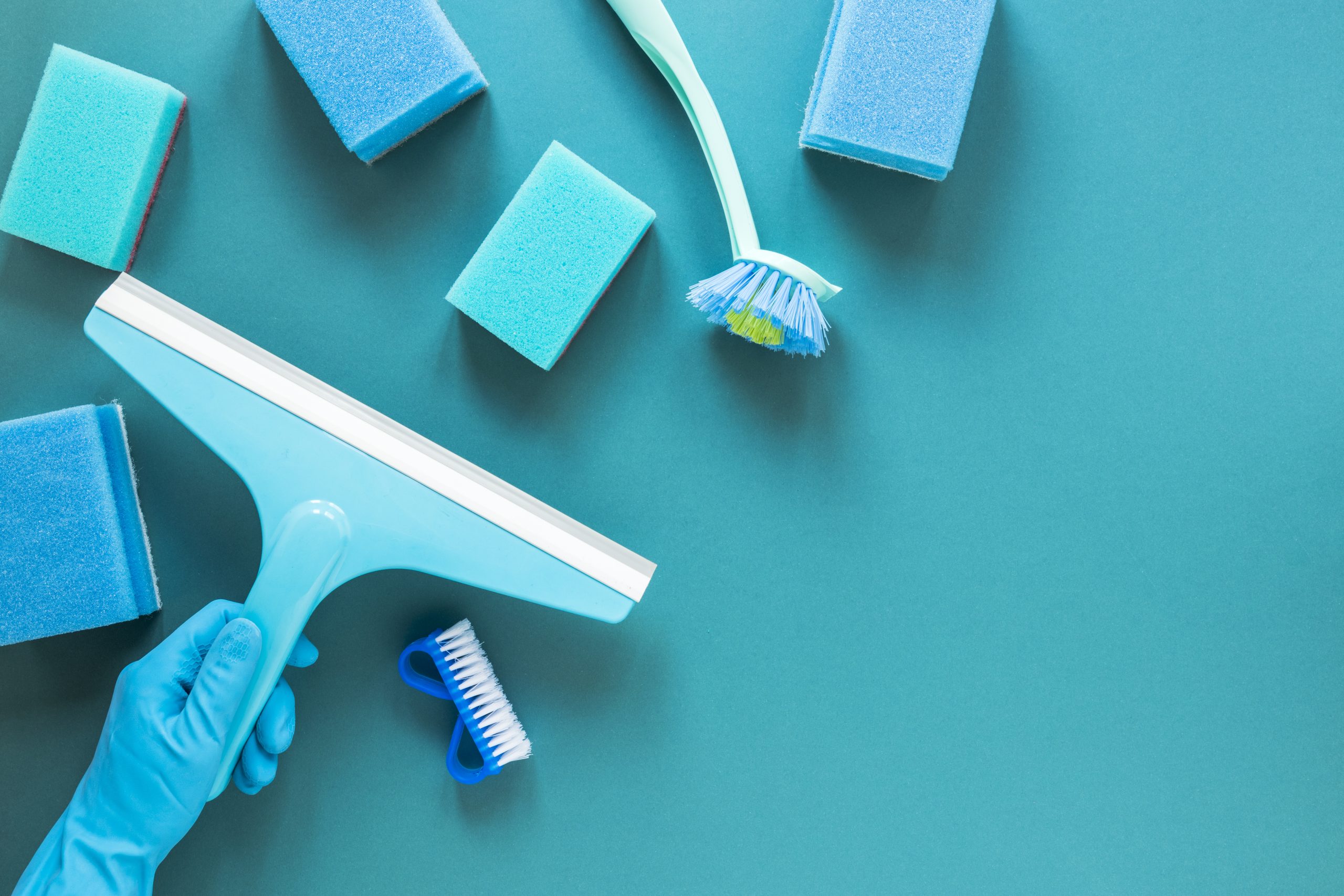 flat-lay-frame-with-blue-cleaning-products-scaled-1